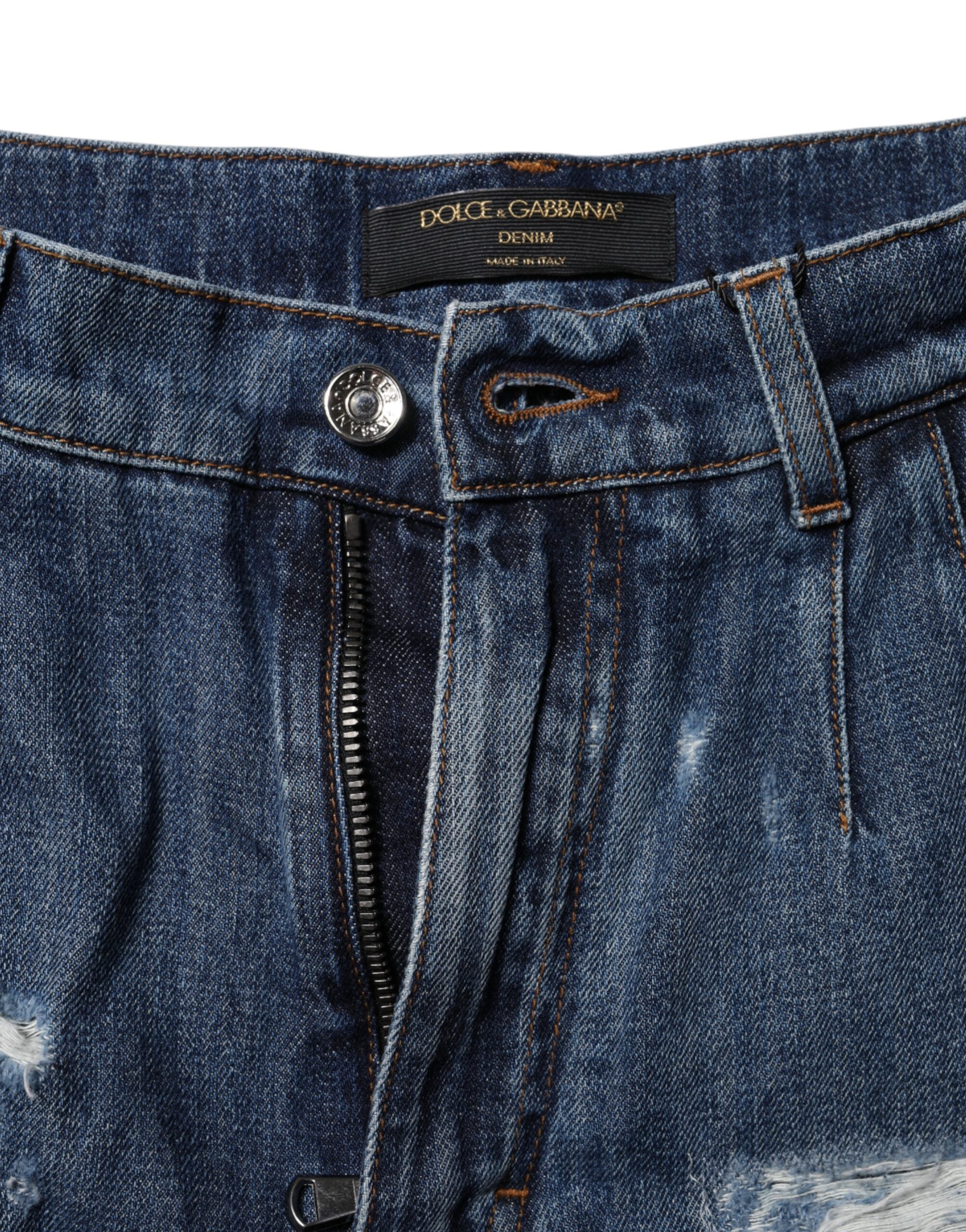 Dolce & Gabbana Bermudashorts aus zerfleddertem Denim aus blauer Baumwolle