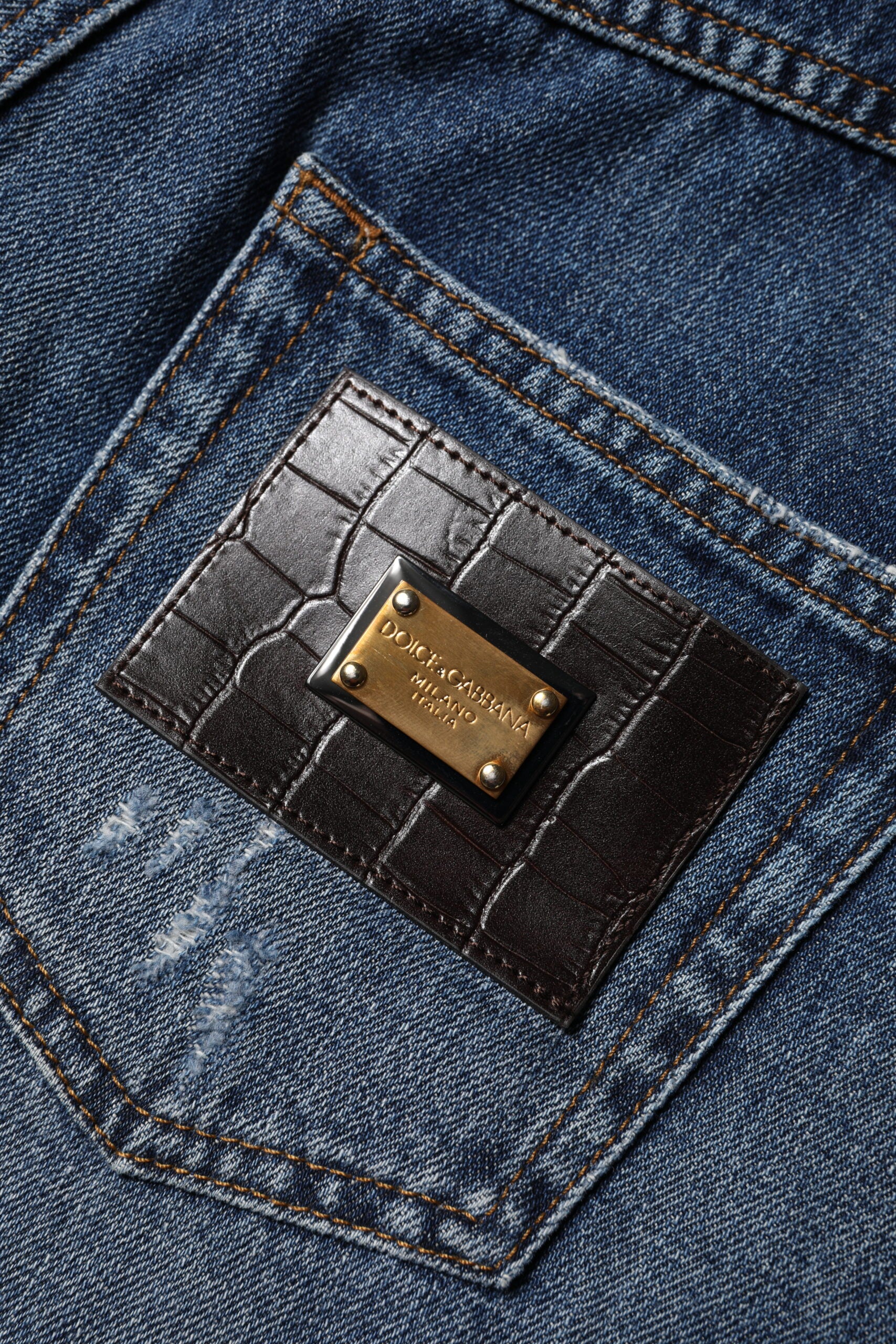 Dolce & Gabbana Bermudashorts aus zerfleddertem Denim aus blauer Baumwolle