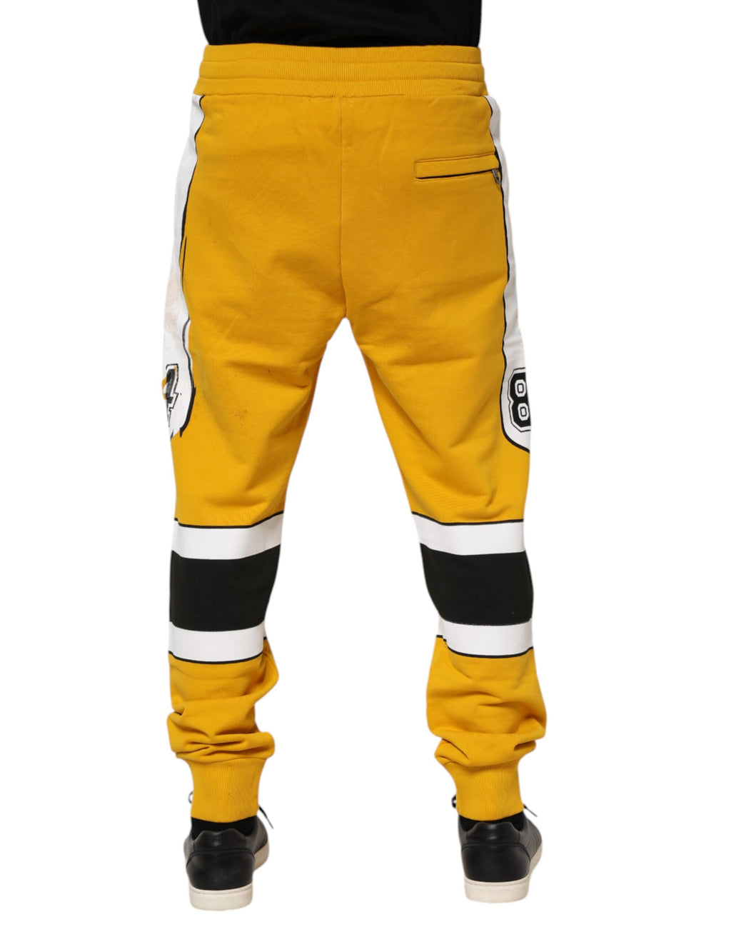 Dolce & Gabbana Gelbe bedruckte Baumwoll-Sweatpants Jogger Pants