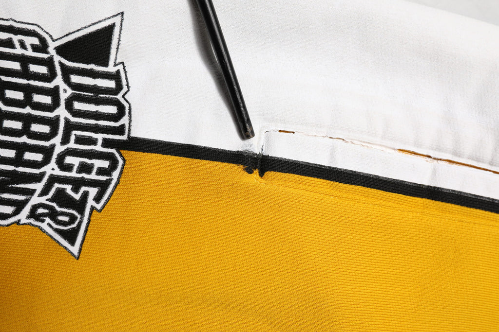 Dolce & Gabbana Gelbe bedruckte Baumwoll-Sweatpants Jogger Pants