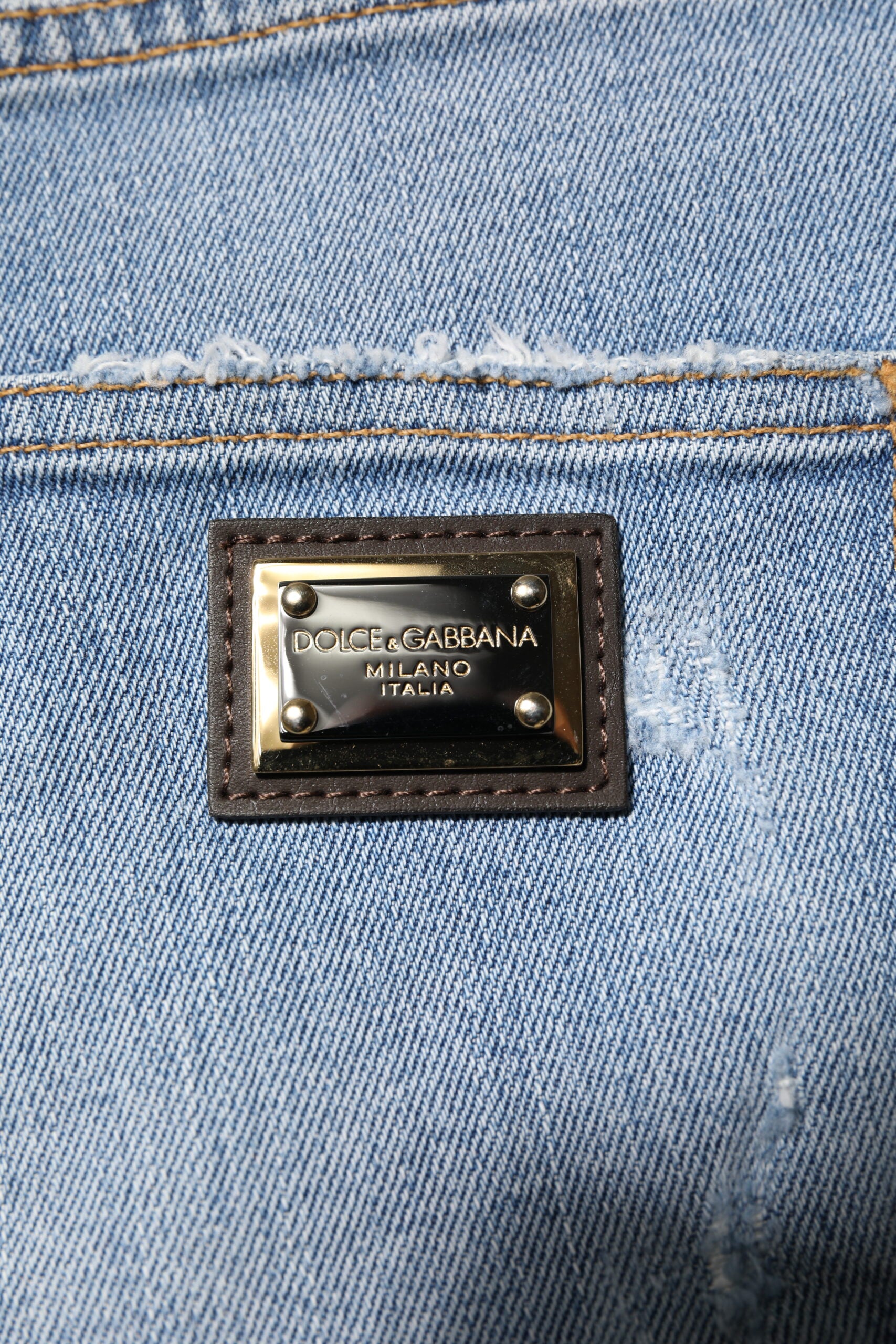 Dolce & Gabbana Blaue zerfledderte Denim-Baumwolle Hot Pants Shorts