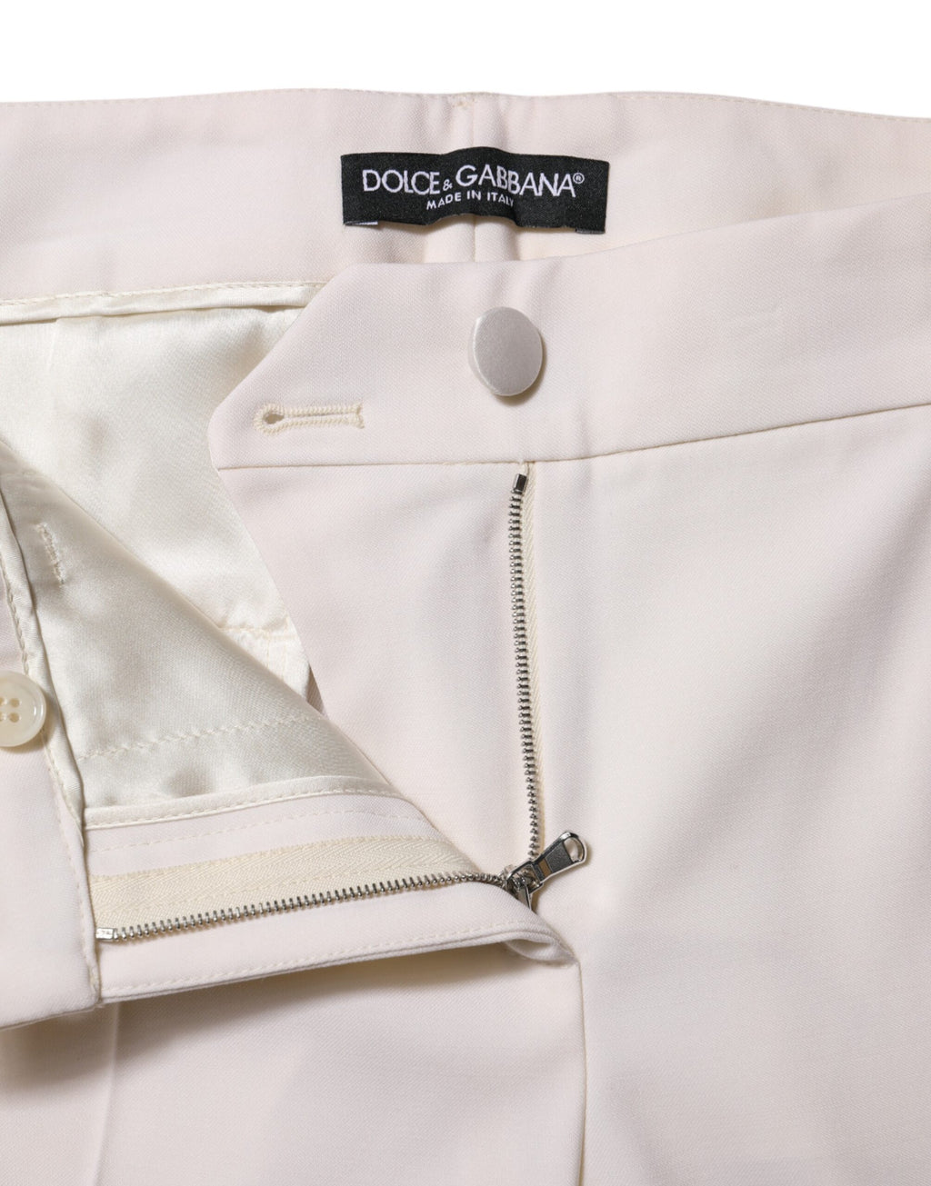 Dolce & Gabbana Weiße konisch zulaufende Hose aus Wolle mit mittlerer Taille
