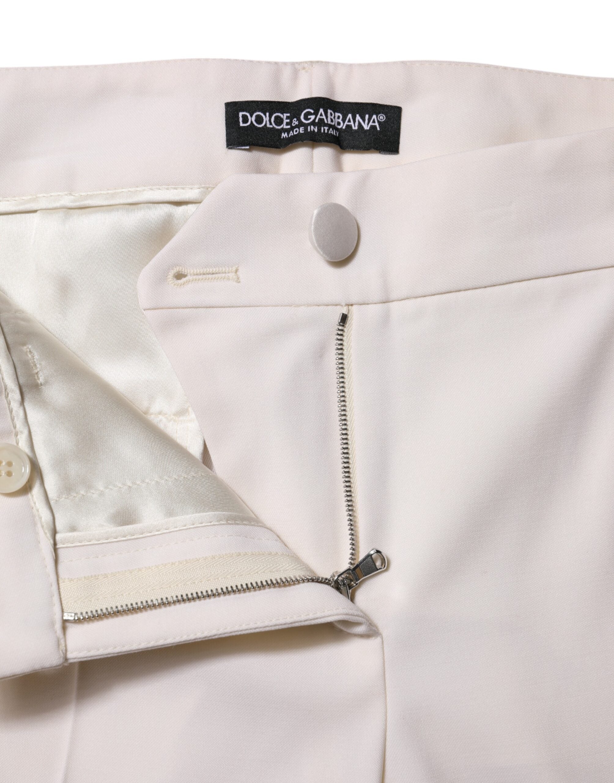 Dolce & Gabbana Weiße konisch zulaufende Hose aus Wolle mit mittlerer Taille
