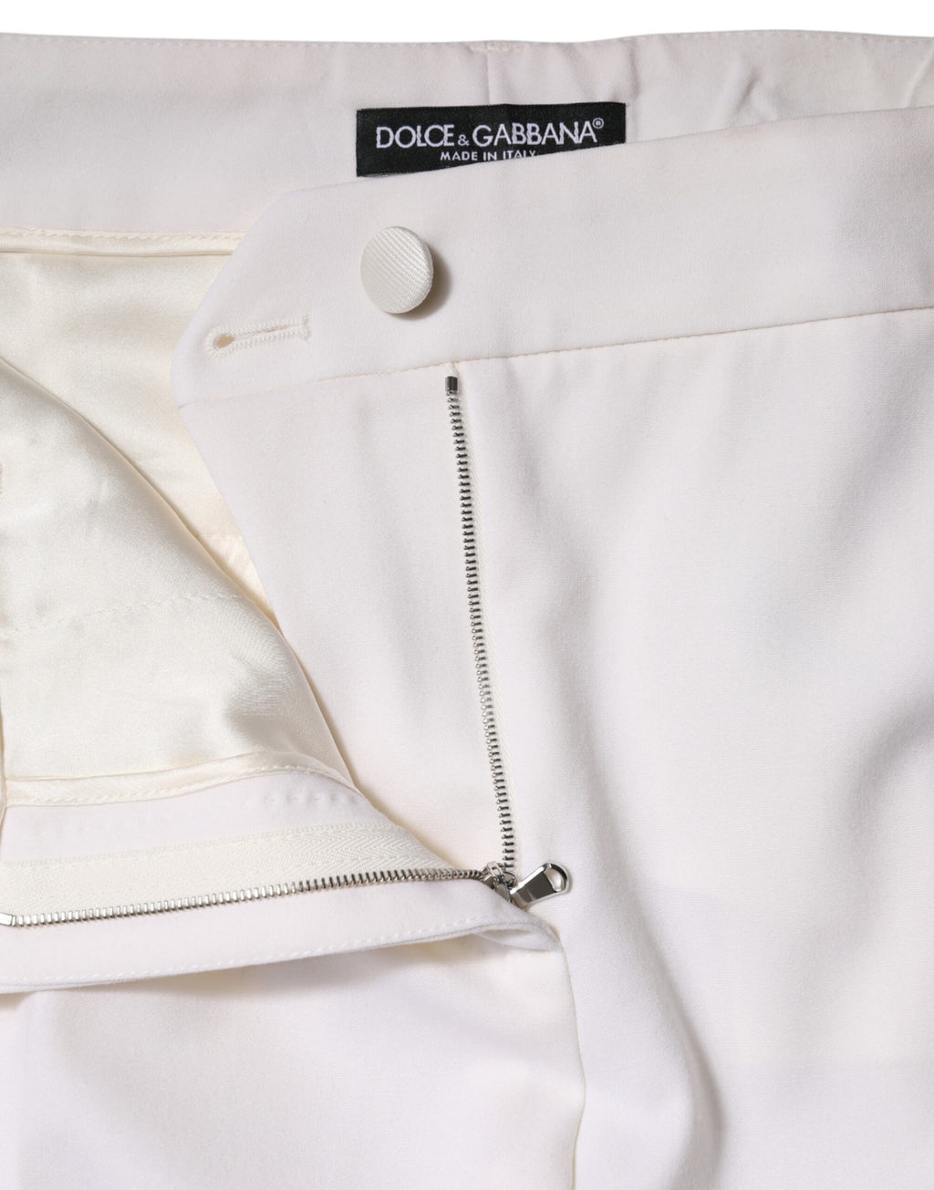 Dolce & Gabbana Weiße konisch zulaufende Hose aus Wolle mit mittlerer Taille