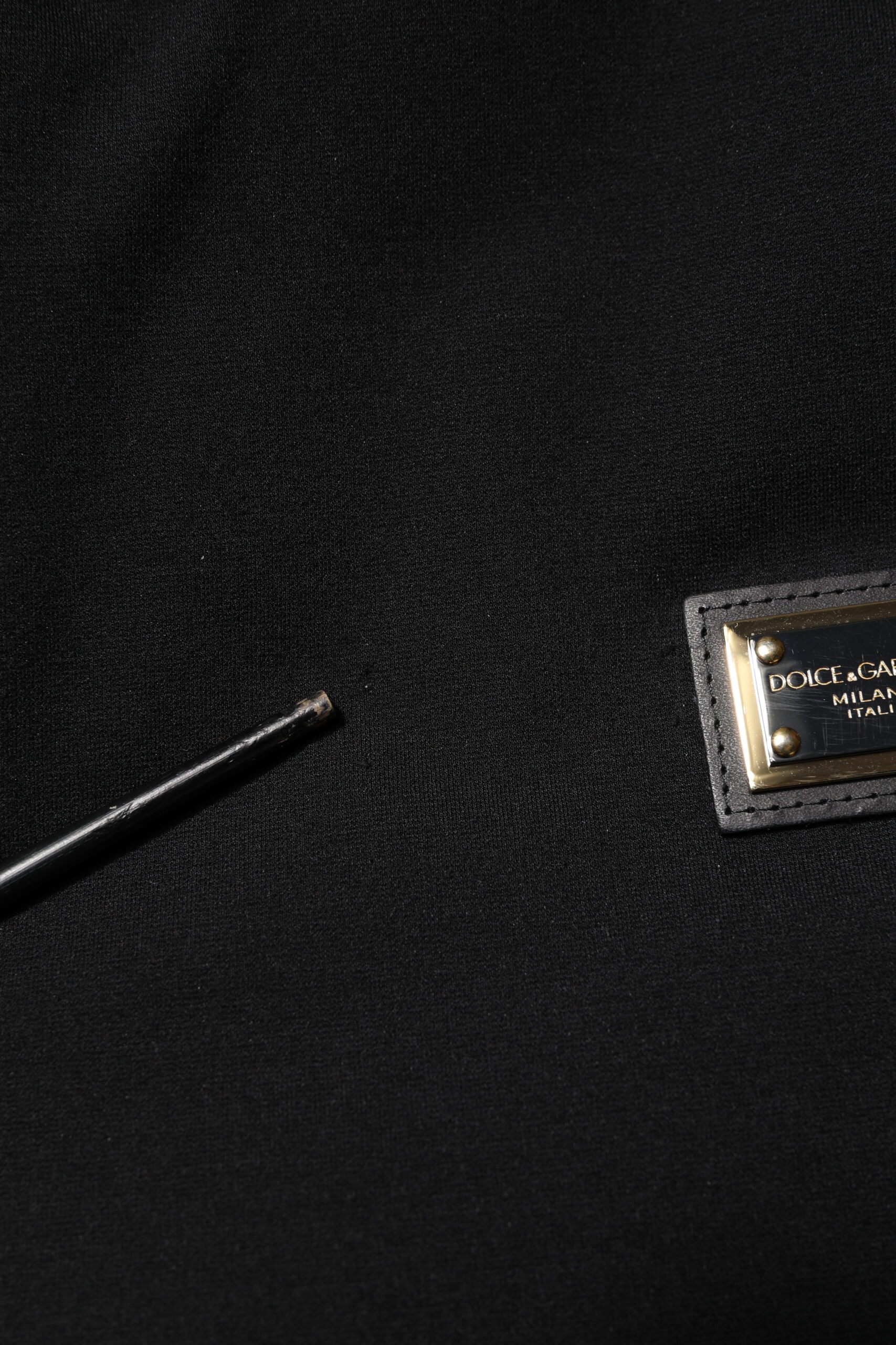 Dolce & Gabbana Schwarze ärmellose Jacke mit Kapuze und Logo-Plakette