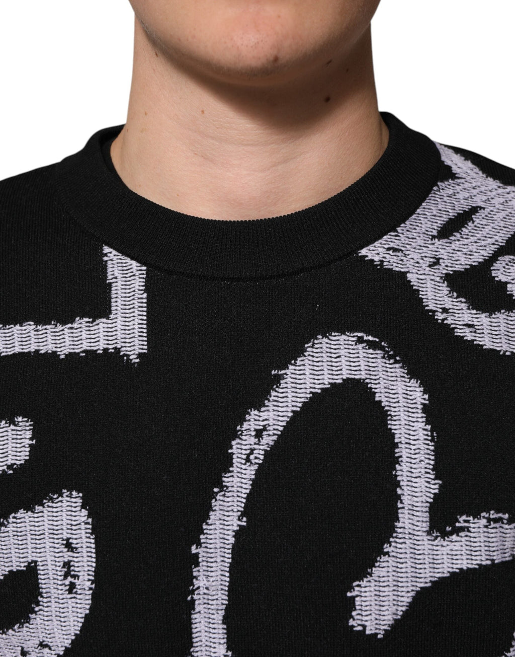 Dolce & Gabbana Schwarzer Pullover aus Nylonwolle mit Herzmotiv