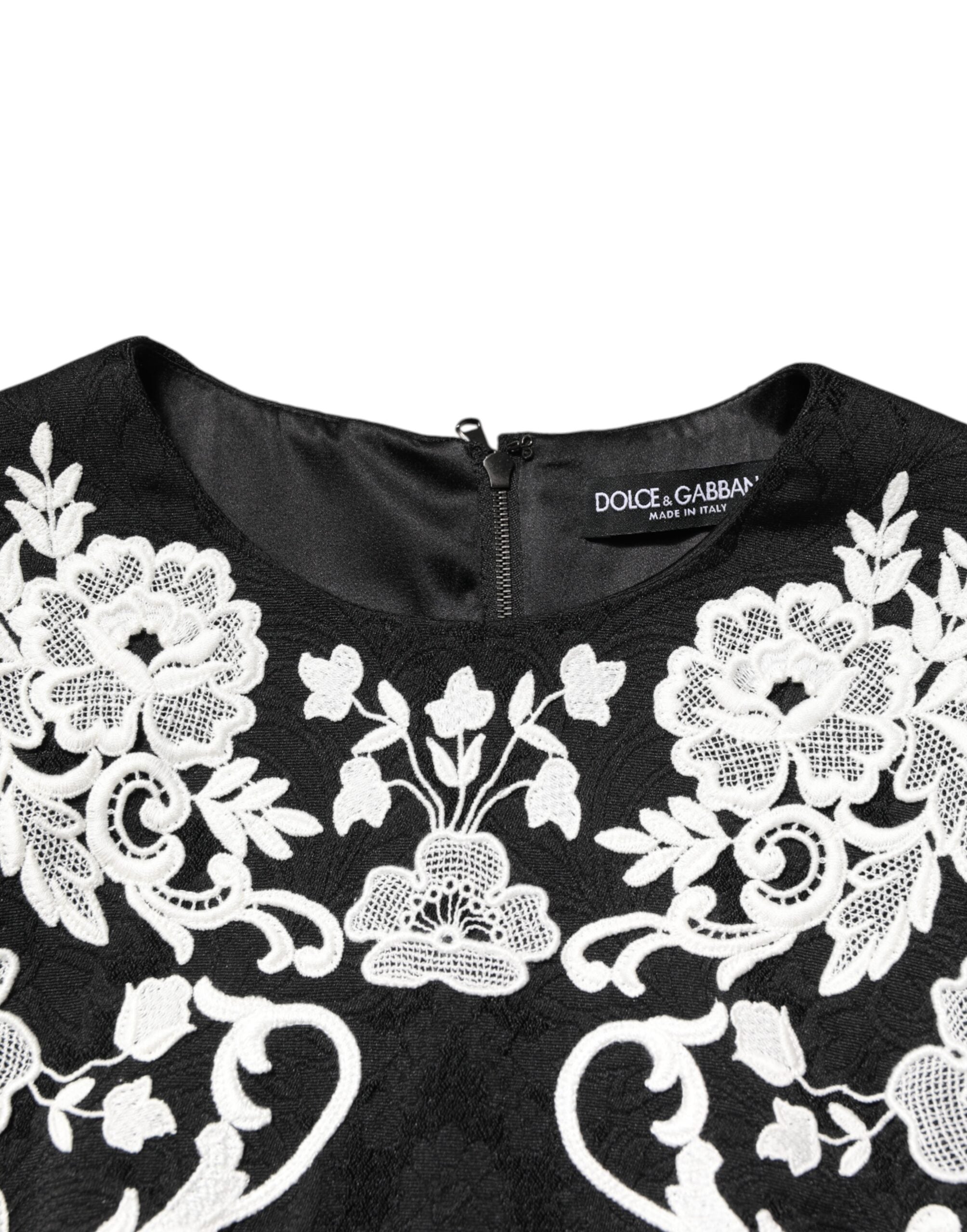 Dolce & Gabbana Schwarzes Kleid mit kurzen Ärmeln und Spitzenbesatz in A-Linie