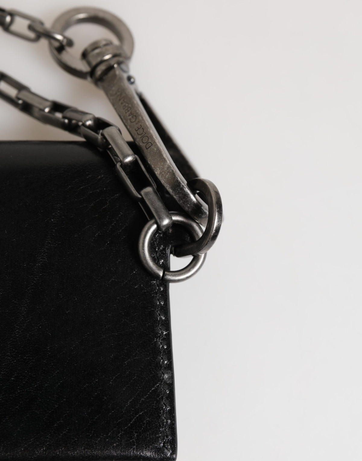 Dolce & Gabbana schwarzes Cavallo Leder Portemonnaie mit Ketten-Druckknopf und zweifachem Kartenhalter