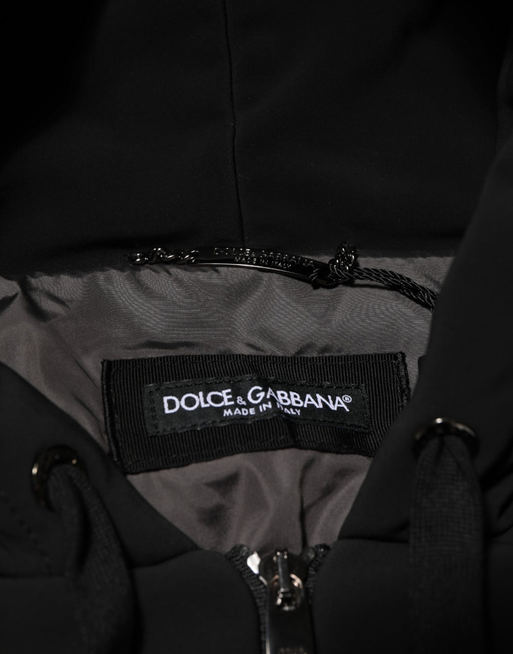 Dolce & Gabbana Kapuzenjacke mit gesteppten Nietenärmeln aus schwarzer Baumwolle