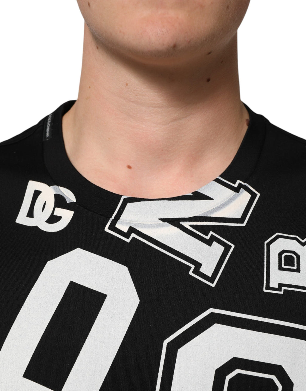 Dolce & Gabbana Schwarzes Baumwoll-T-Shirt mit Buchstabenaufdruck und kurzen Ärmeln