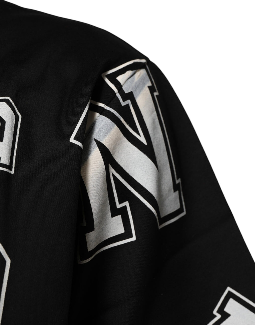 Dolce & Gabbana Schwarzes Baumwoll-T-Shirt mit Buchstabenaufdruck und kurzen Ärmeln