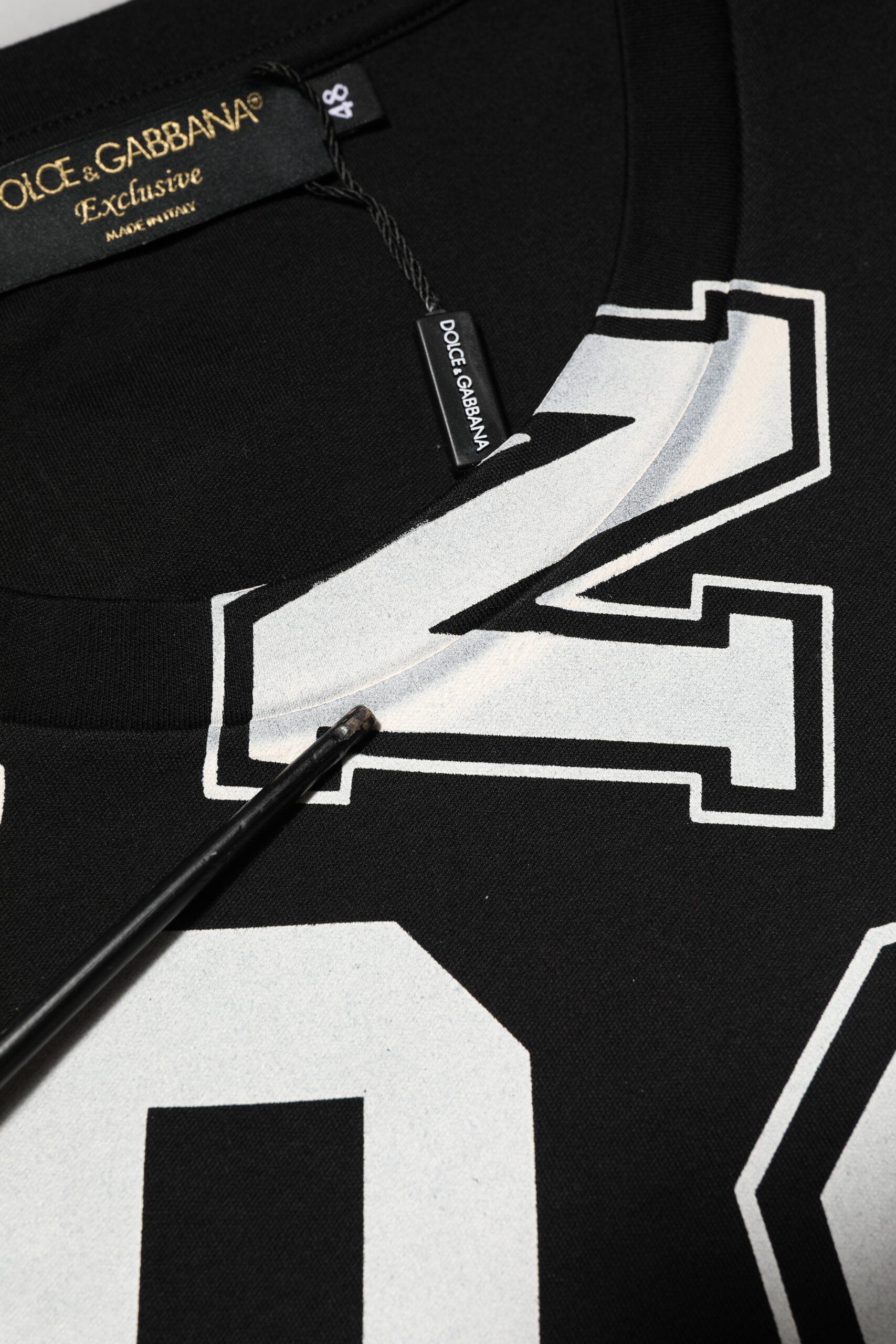 Dolce & Gabbana Schwarzes Baumwoll-T-Shirt mit Buchstabenaufdruck und kurzen Ärmeln