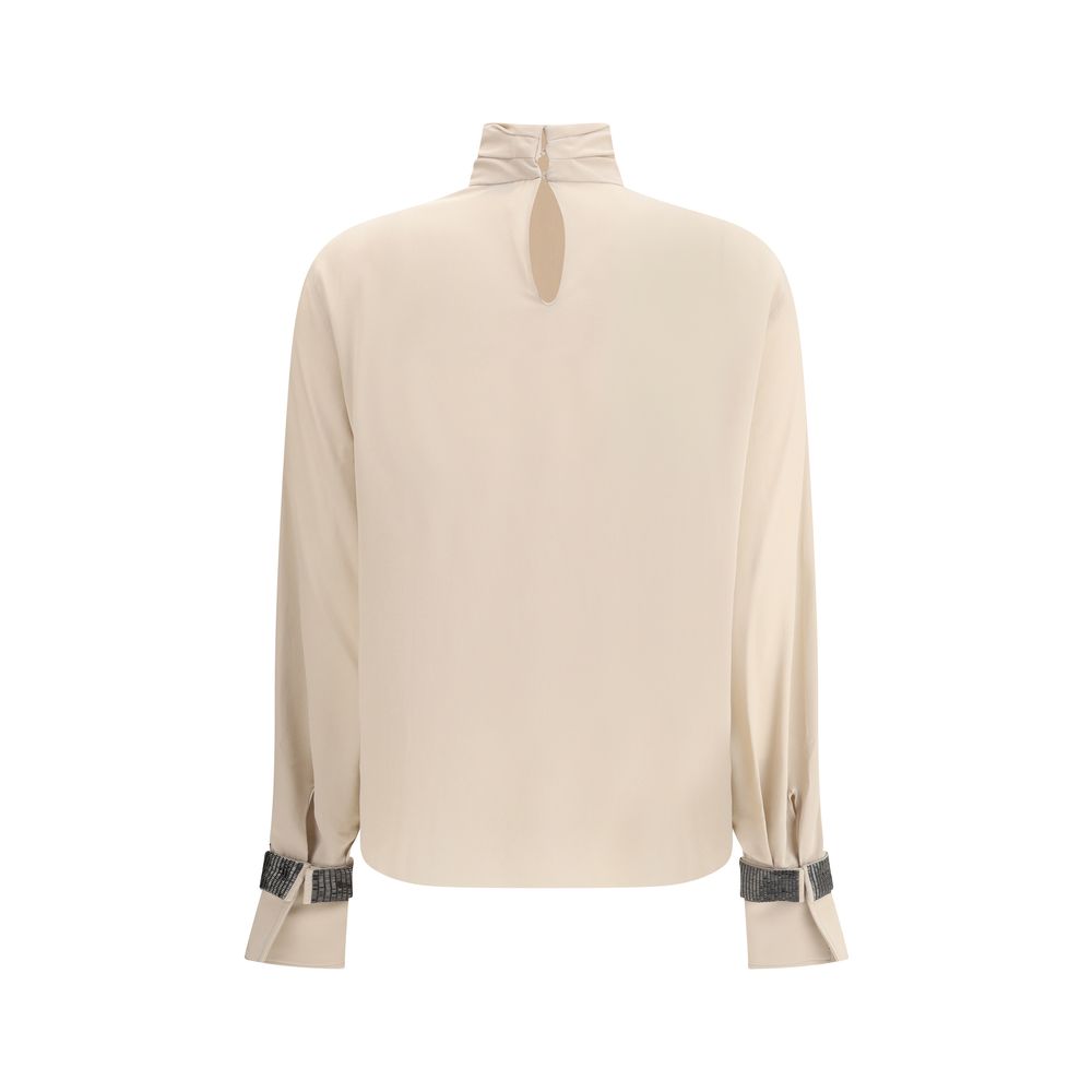 Brunello Cucinelli Seiden-Rollkragenbluse mit kostbaren Armbändern