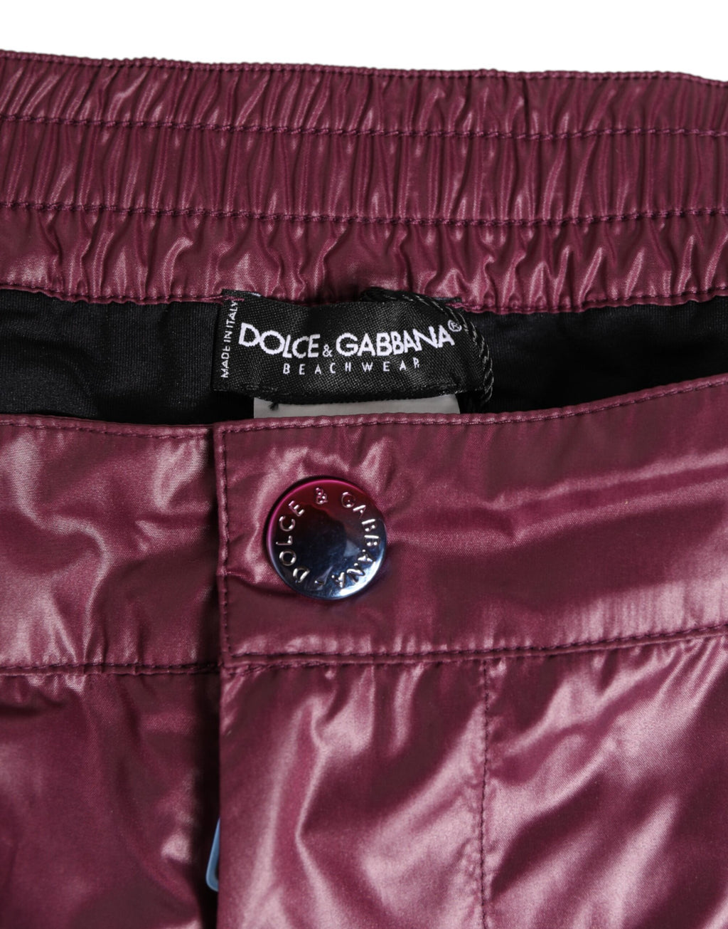 Dolce & Gabbana Burgunderrote Polyester-Badebekleidung mit geprägtem Wappen