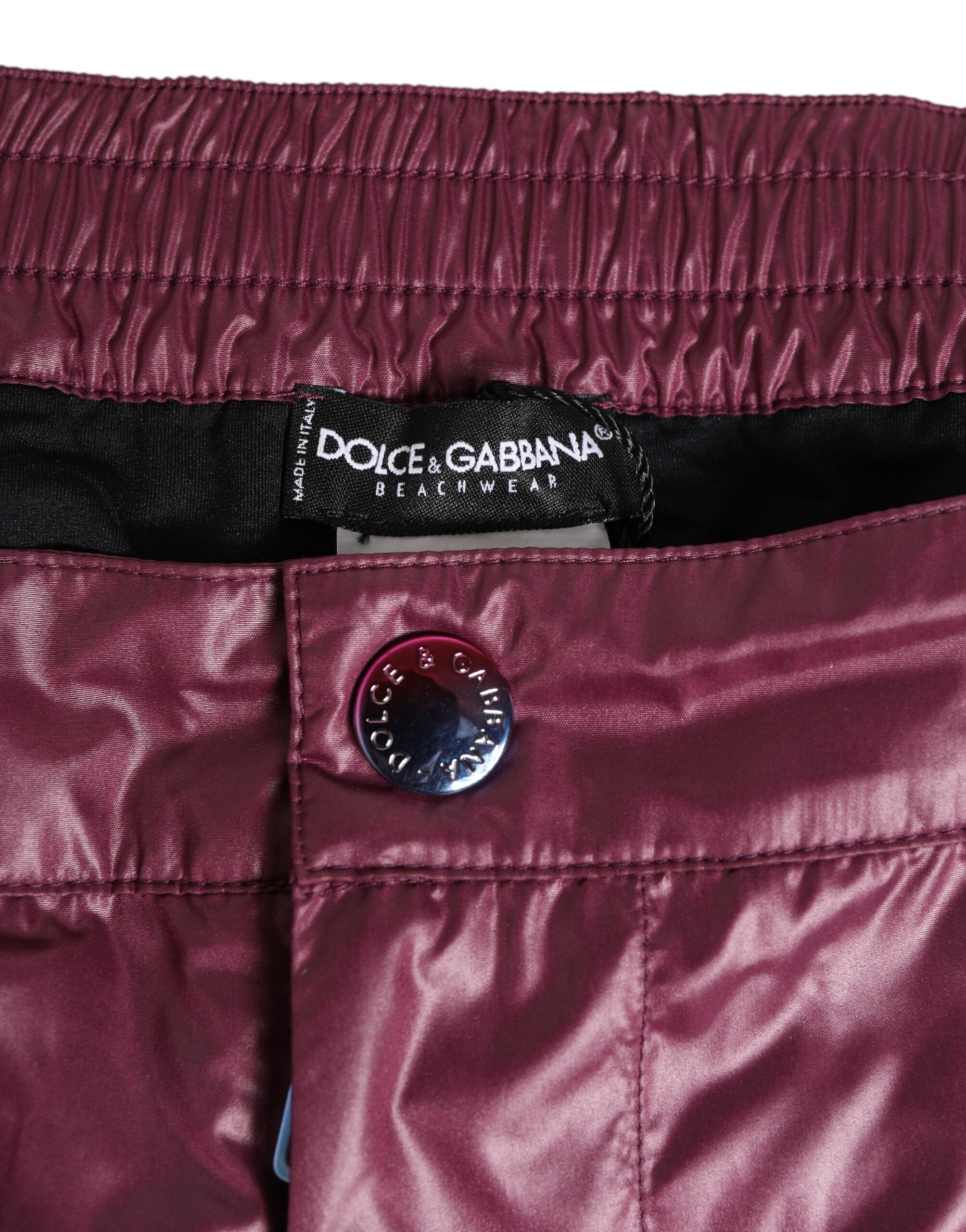 Dolce & Gabbana Burgunderrote Polyester-Badebekleidung mit geprägtem Wappen