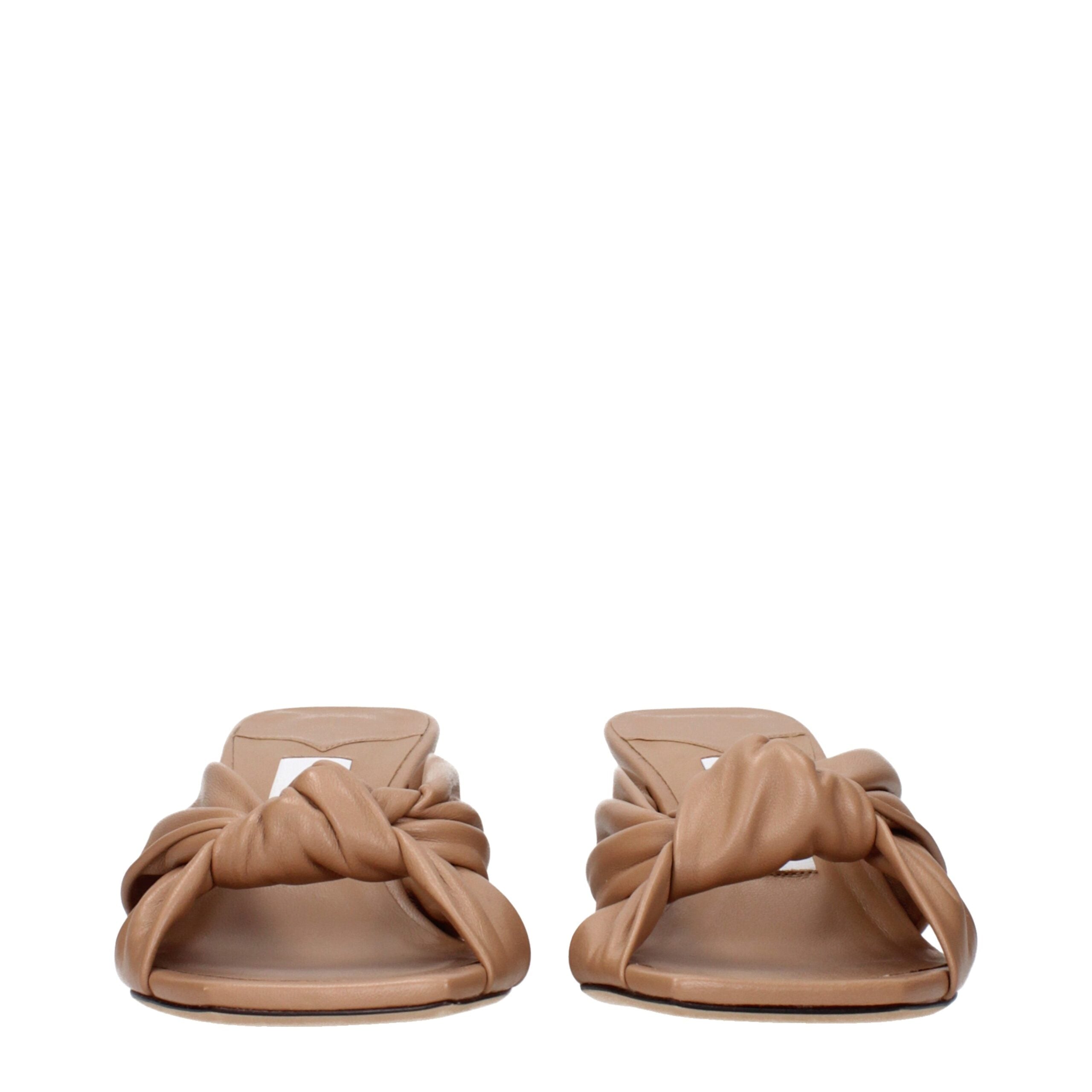 Jimmy Choo Flache Sandalen aus Leder in Beige