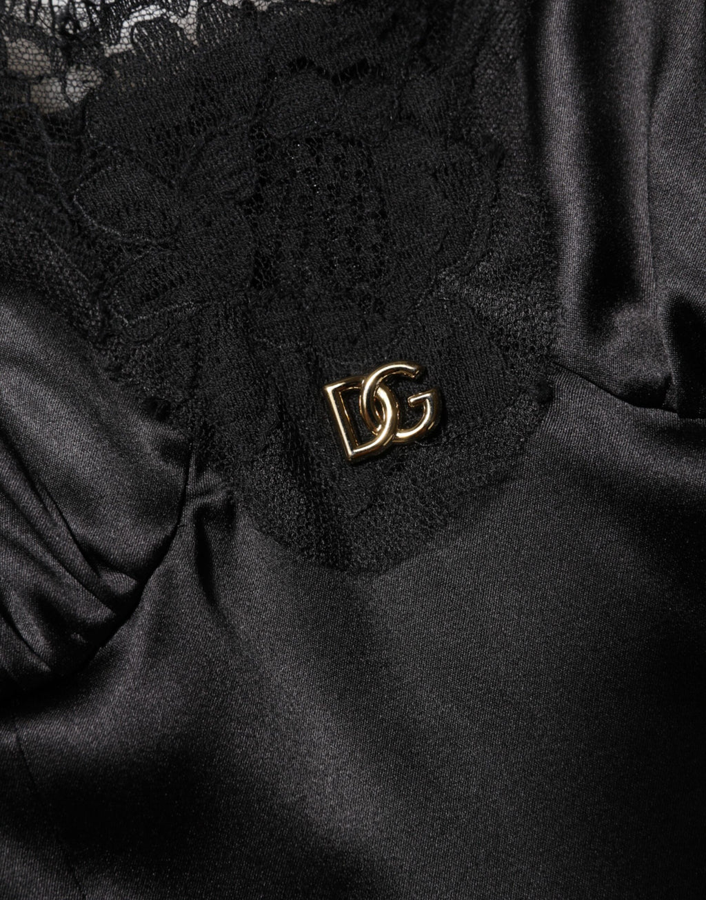 Dolce & Gabbana Schwarzes ärmelloses Minikleid mit Spitzenbesatz aus einer Seidenmischung