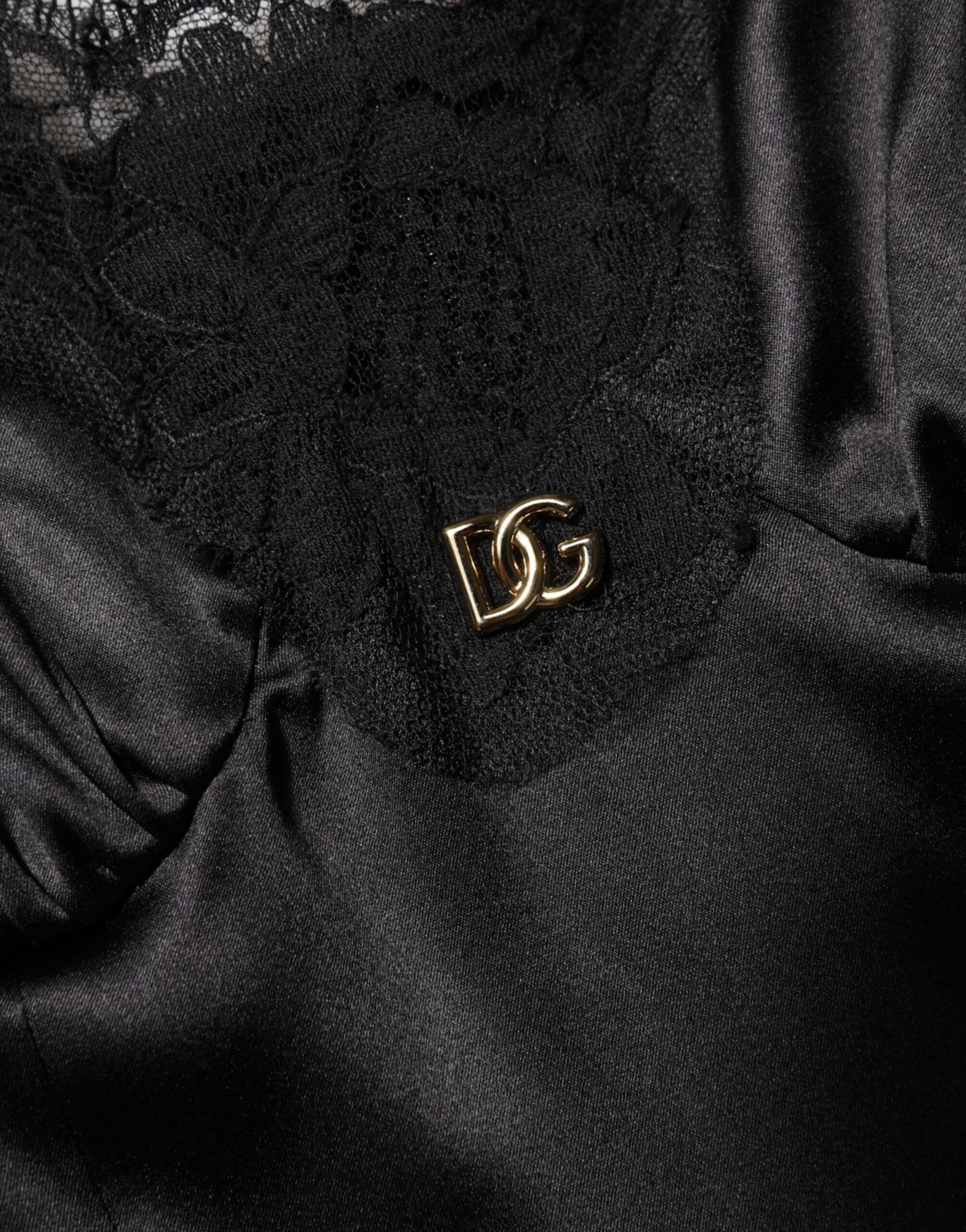 Dolce & Gabbana Schwarzes ärmelloses Minikleid mit Spitzenbesatz aus einer Seidenmischung