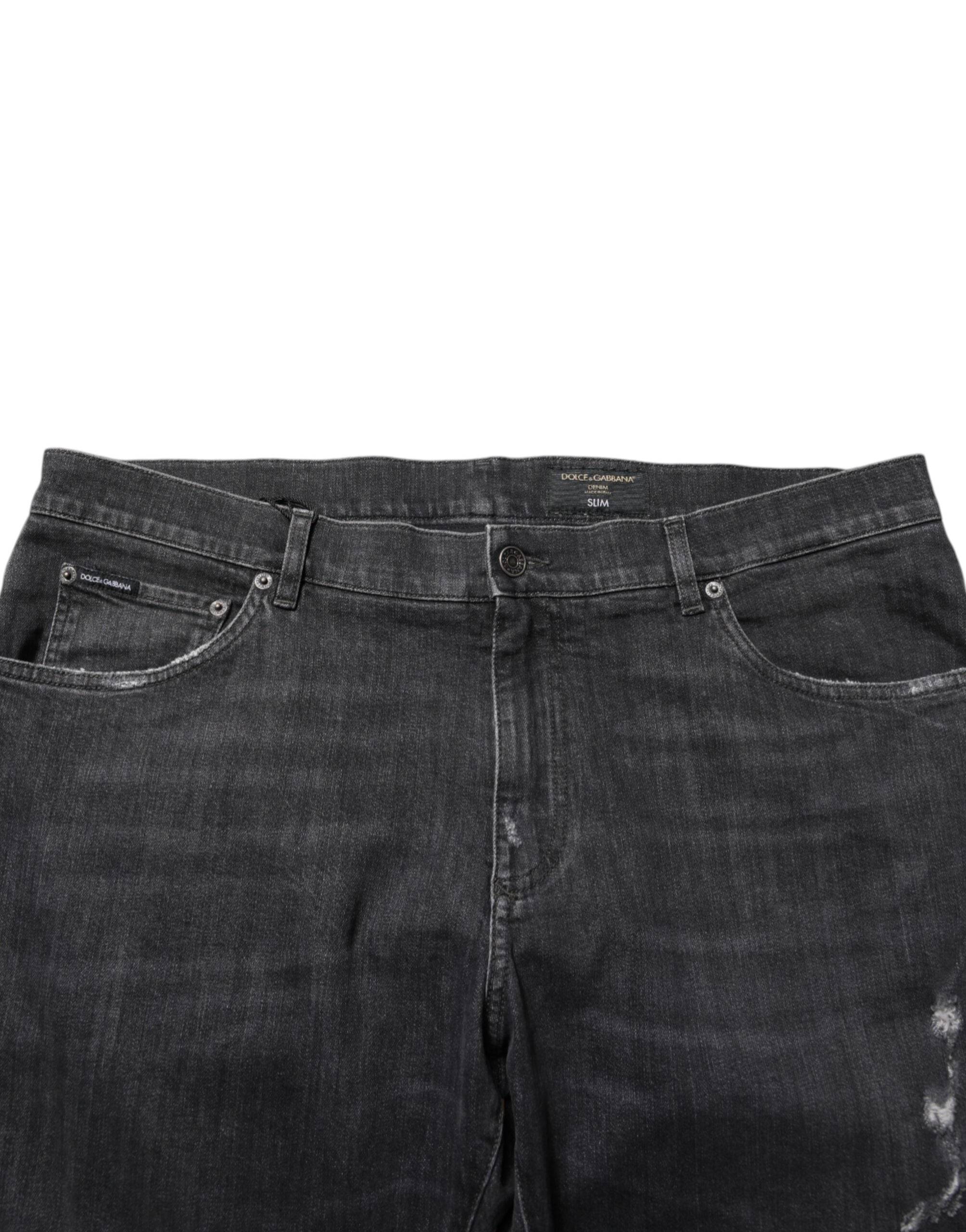 Dolce & Gabbana Schwarze Slim Fit-Jeans aus Baumwolle mit zerrissenem Logo