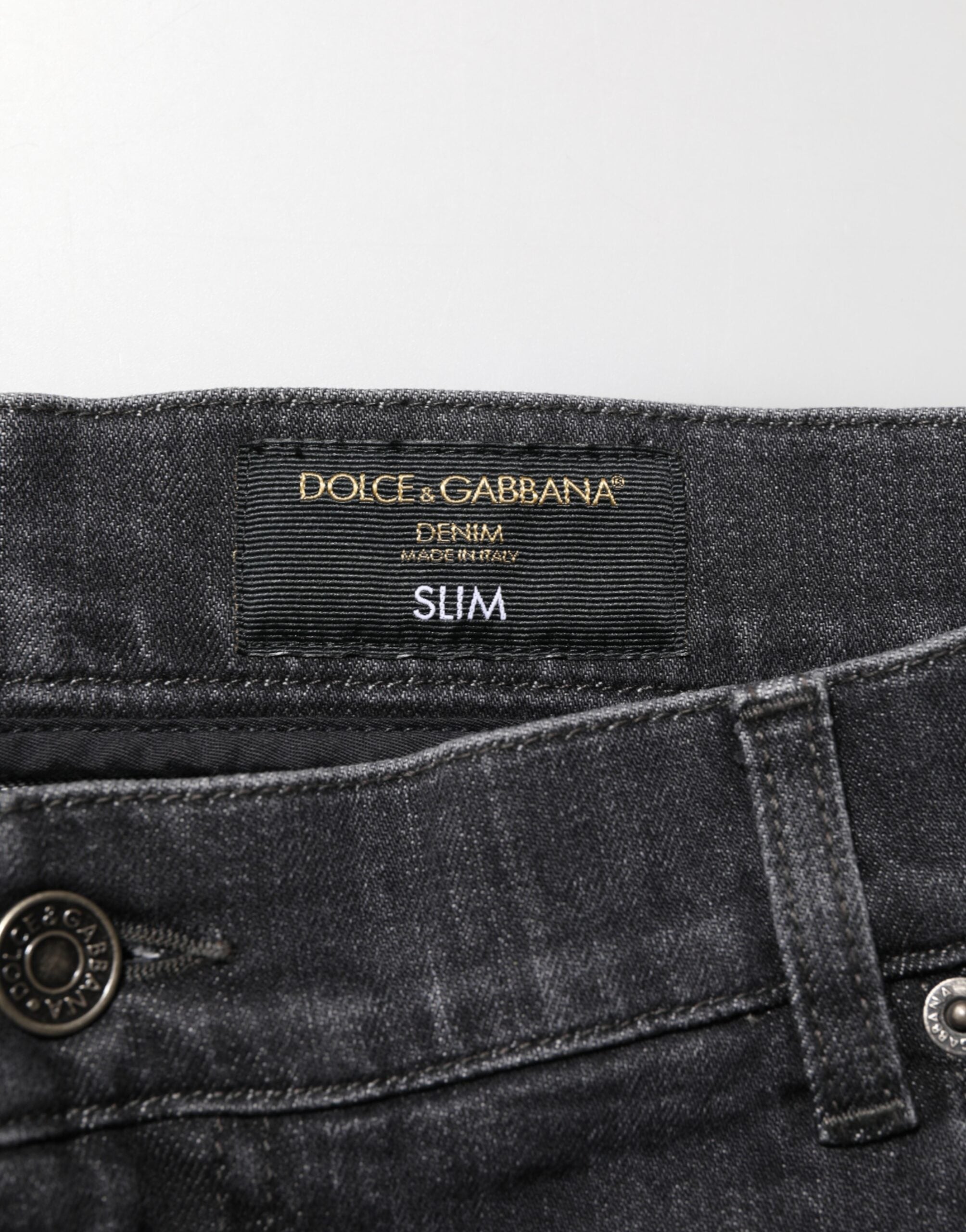 Dolce & Gabbana Schwarze Slim Fit-Jeans aus Baumwolle mit zerrissenem Logo
