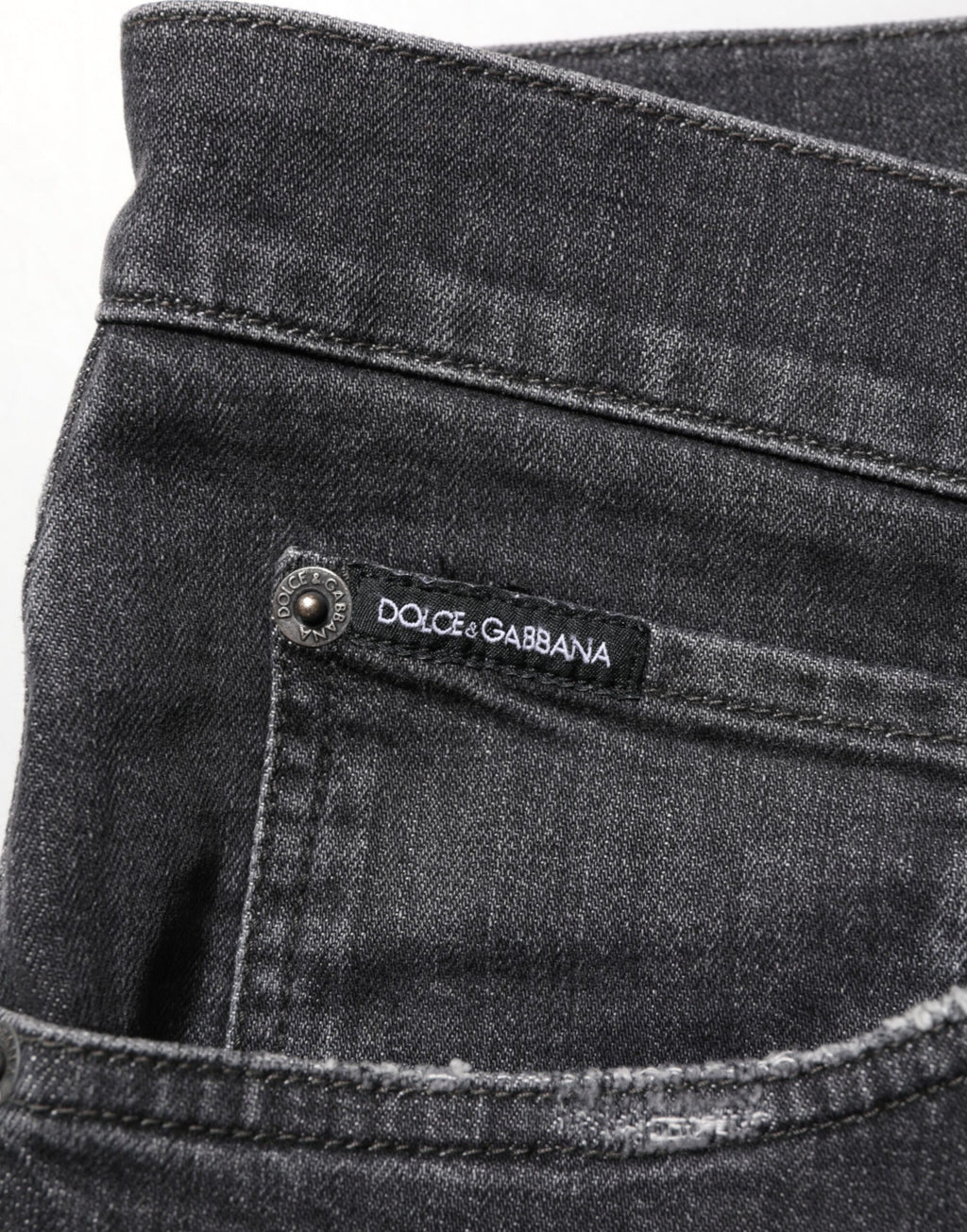 Dolce & Gabbana Schwarze Slim Fit-Jeans aus Baumwolle mit zerrissenem Logo