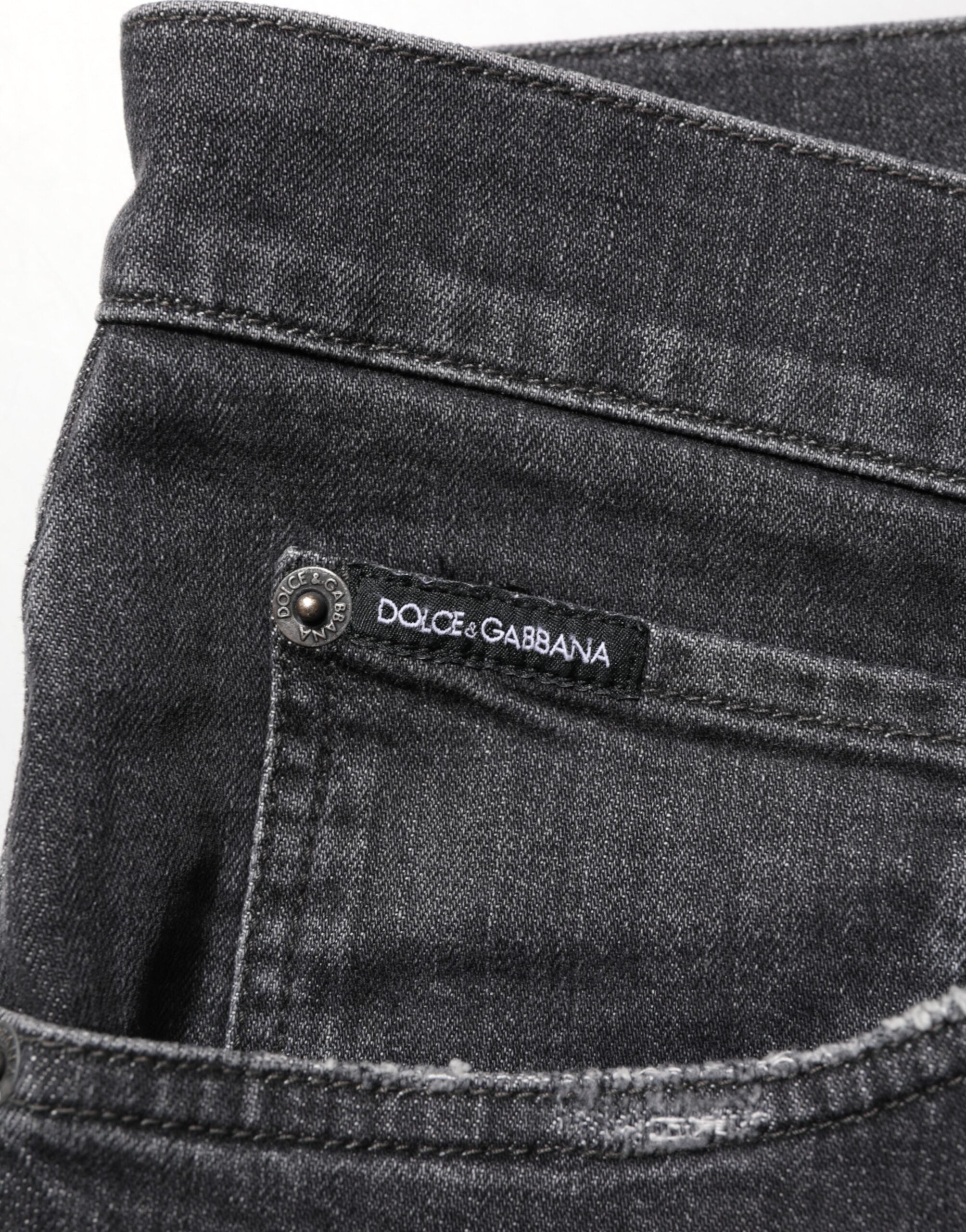 Dolce & Gabbana Schwarze Slim Fit-Jeans aus Baumwolle mit zerrissenem Logo