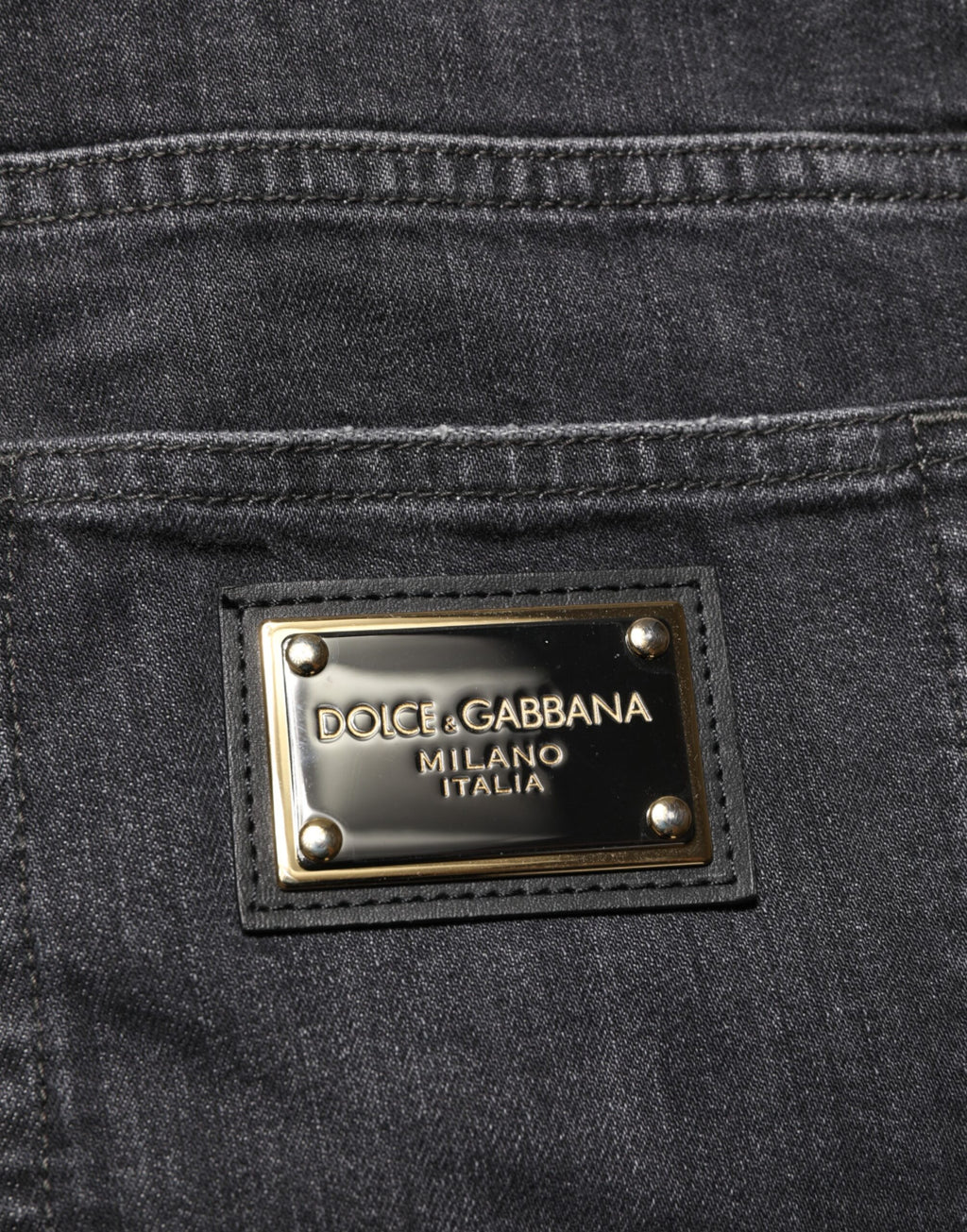 Dolce & Gabbana Schwarze Slim Fit-Jeans aus Baumwolle mit zerrissenem Logo