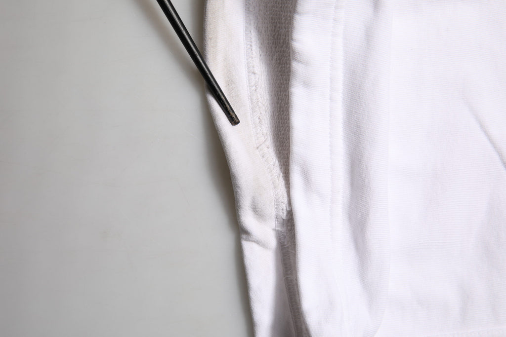 Dolce & Gabbana Weiße Cargohose aus Baumwolle mit Logoaufnäher