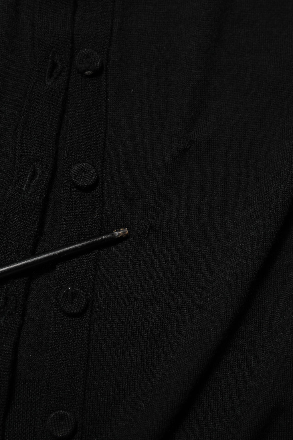 Dolce & Gabbana Schwarzer Strickpullover aus Schurwolle mit Knöpfen