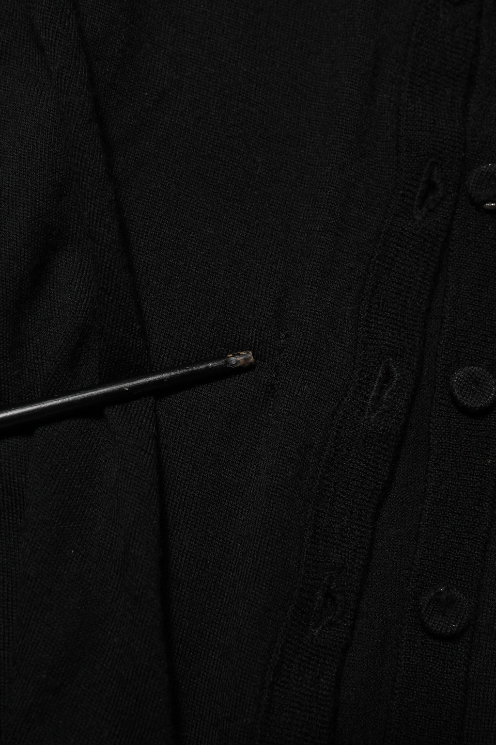 Dolce & Gabbana Schwarzer Strickpullover aus Schurwolle mit Knöpfen