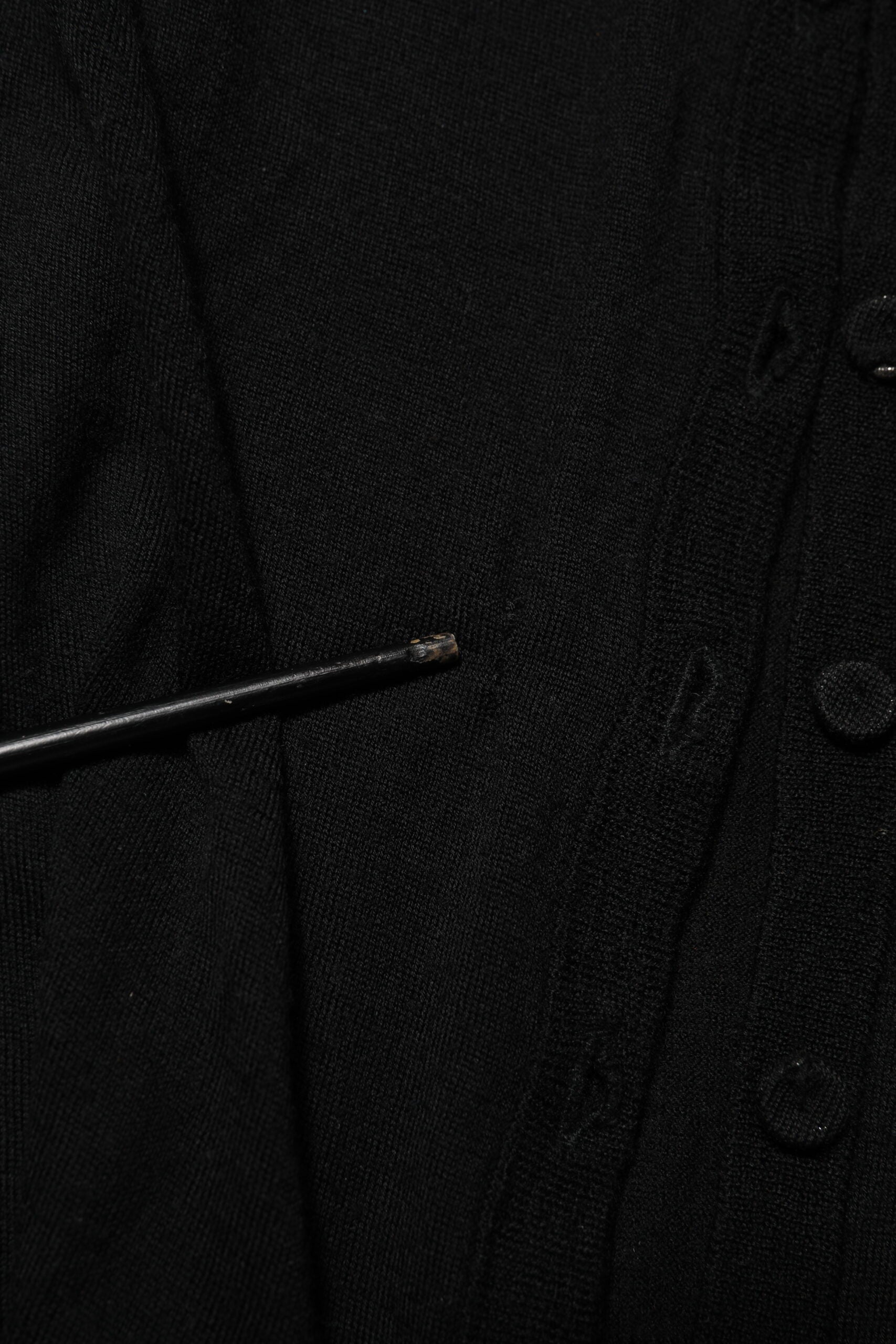 Dolce & Gabbana Schwarzer Strickpullover aus Schurwolle mit Knöpfen