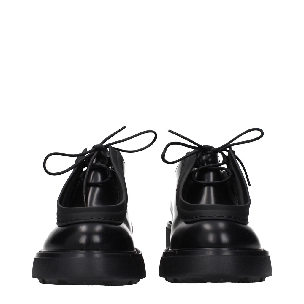 Prada Schwarze Leder Oxfords und Derbies