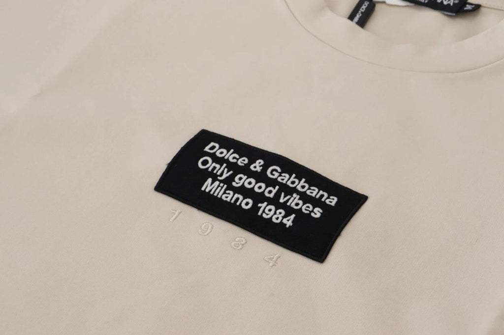 Dolce & Gabbana Elfenbeinfarbene Baumwolle Elfenbeinfarbener bedruckter Rundhalsausschnitt