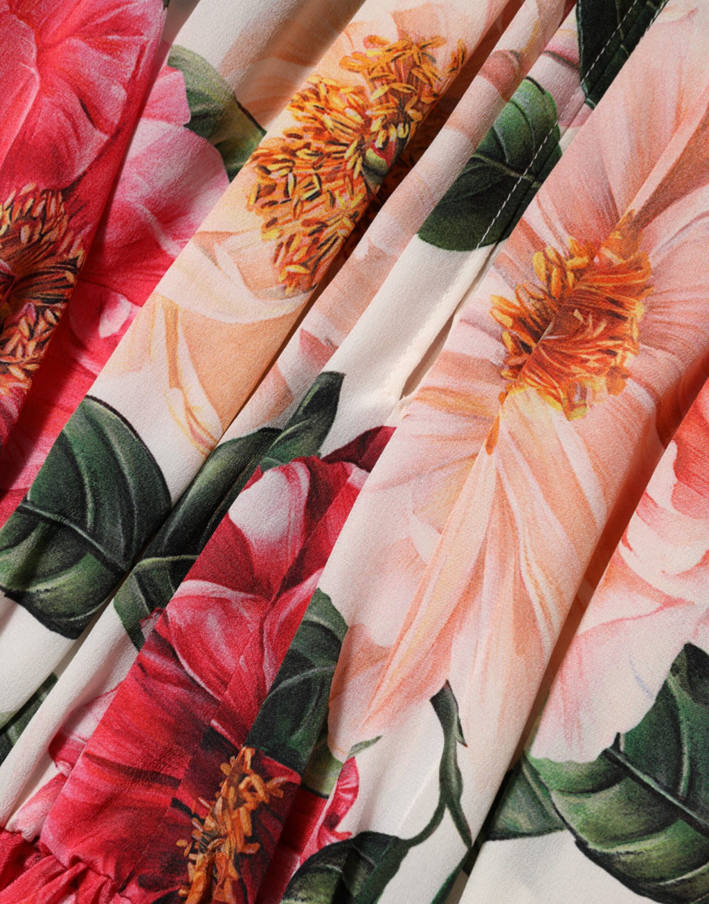 Dolce & Gabbana Rosa Blusenoberteil aus Seide mit Blumenmuster und Rüschen