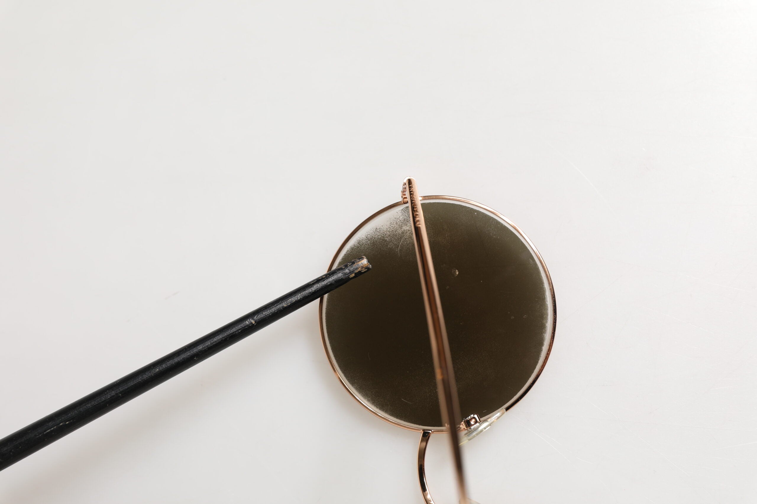 Dolce & Gabbana DG2215K Goldene Metall-Sonnenbrille mit runden Gläsern