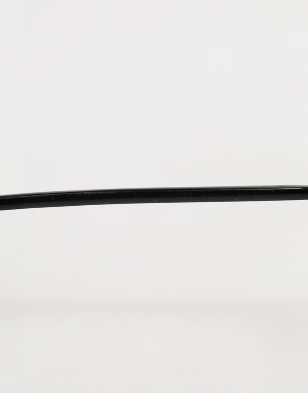 Dolce & Gabbana Sonnenbrille mit eckigen Gläsern und schwarzem Metallrahmen