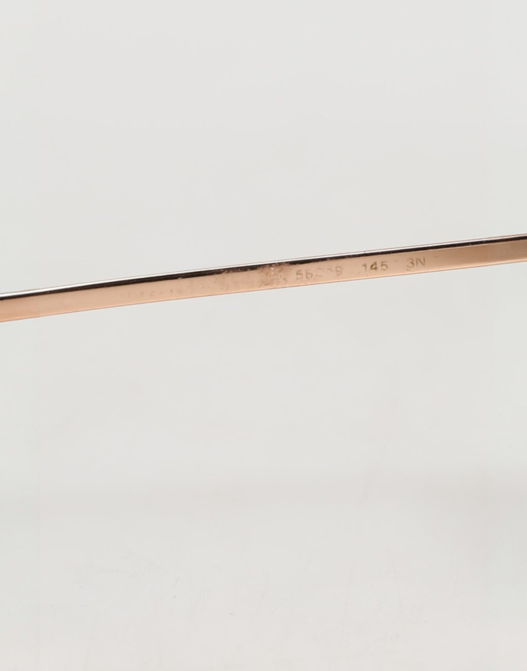 Dolce & Gabbana Sonnenbrille mit roségoldenen Rändern und runden Gläsern