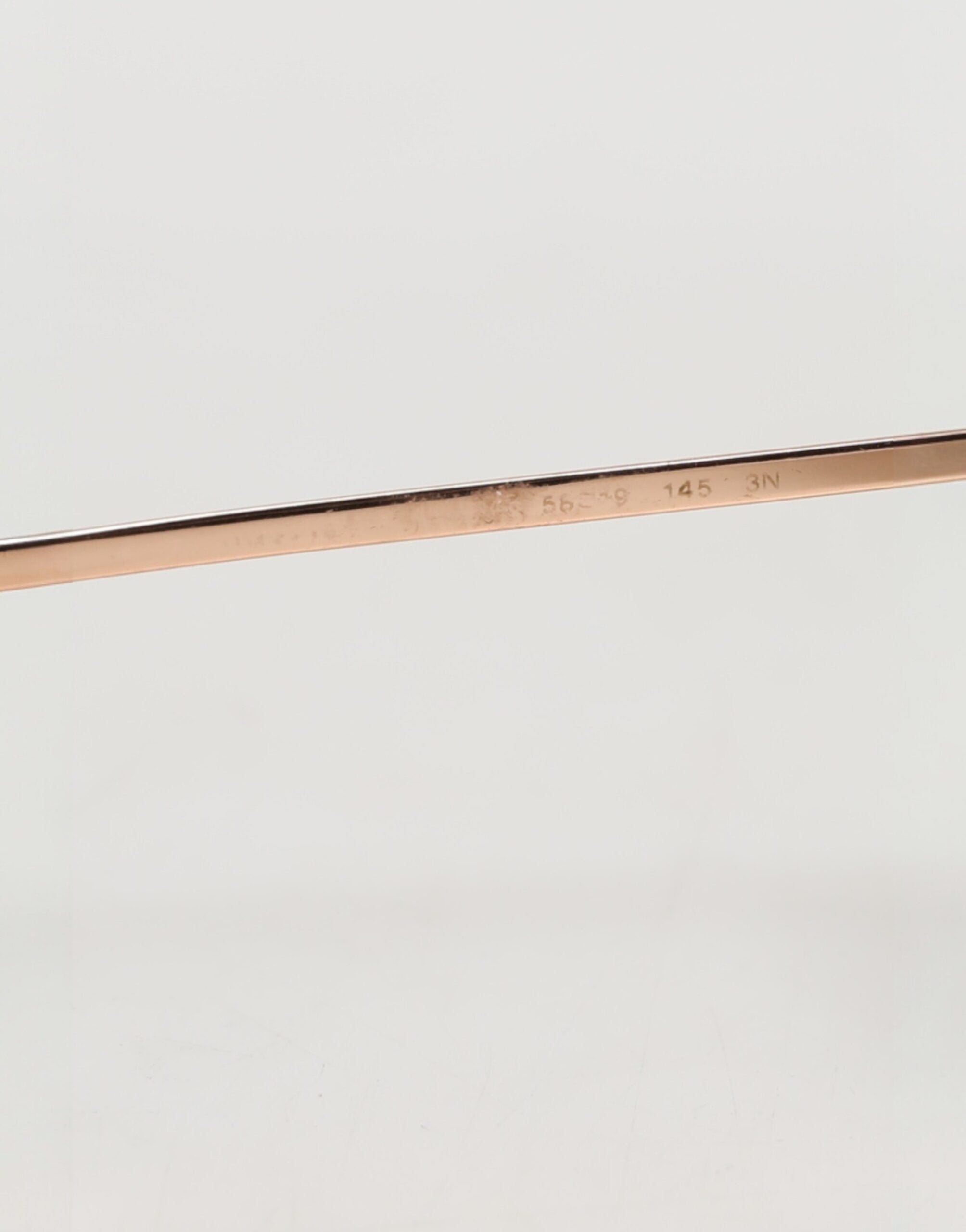 Dolce & Gabbana Sonnenbrille mit roségoldenen Rändern und runden Gläsern