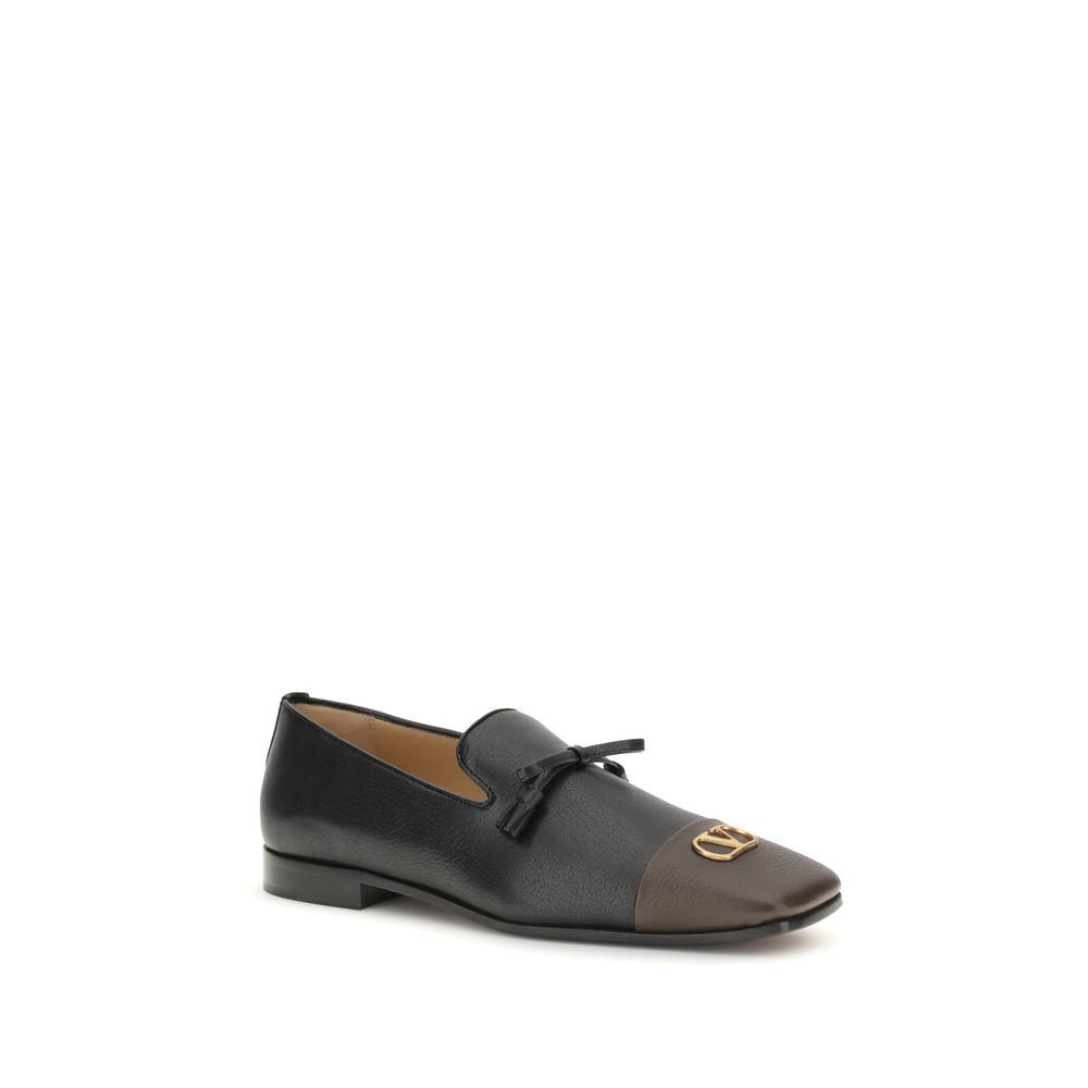 Valentino Garavani Schwarze Leder-Slipper