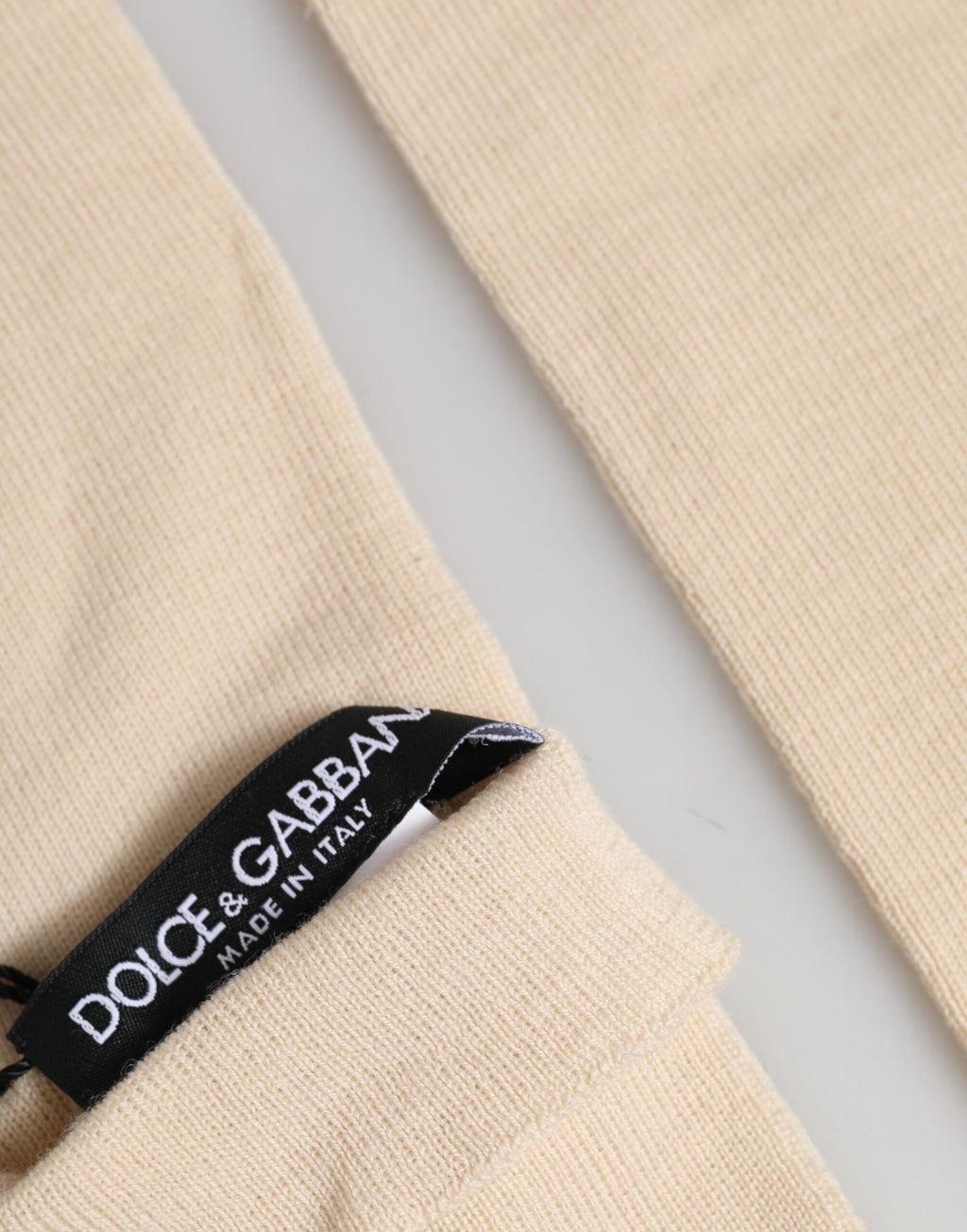 Dolce & Gabbana Beigefarbene Fingerlose Damen-Armstulpen aus Wolle