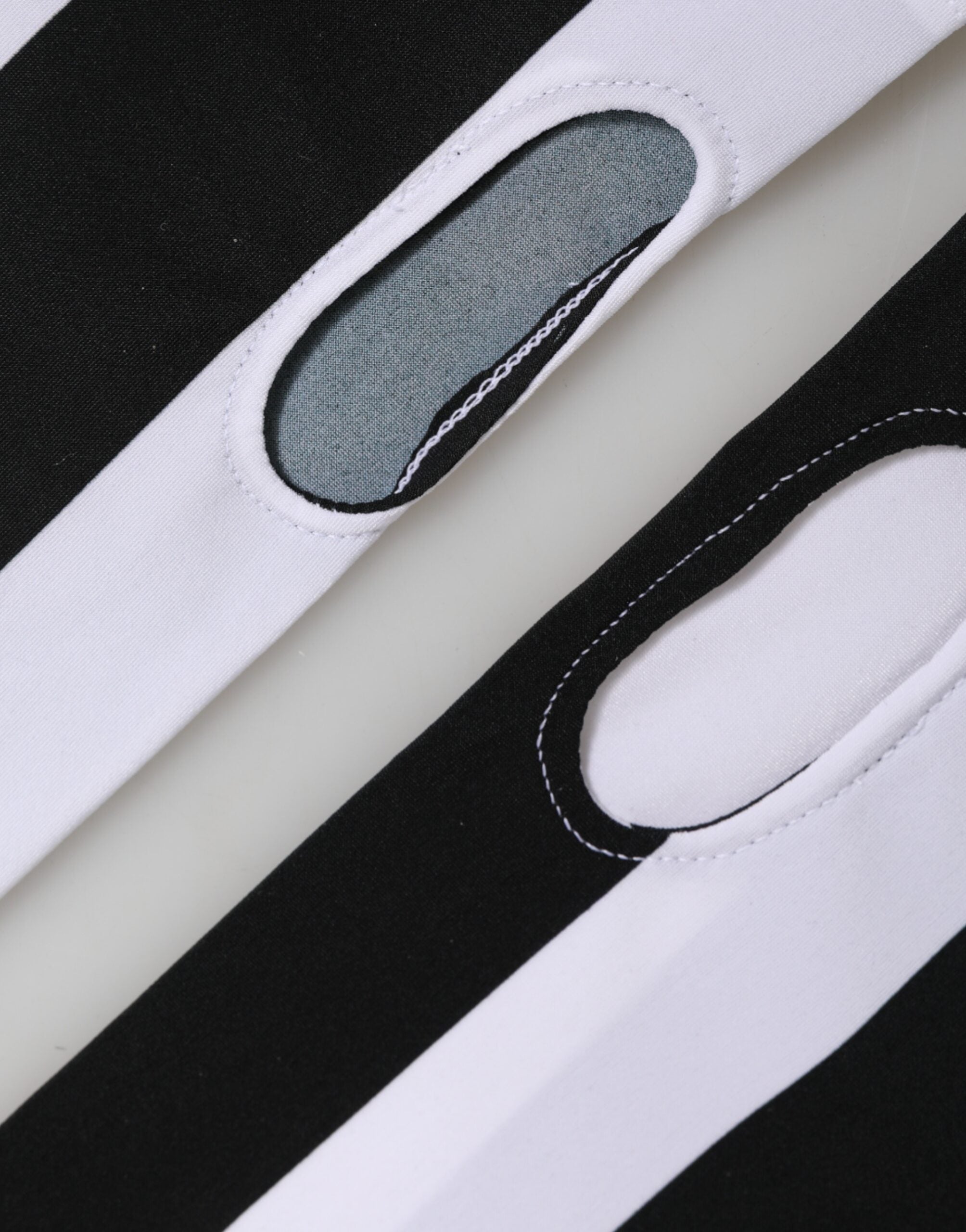 Dolce & Gabbana Fingerlose Handschuhe aus Nylon in Schwarz-Weiß